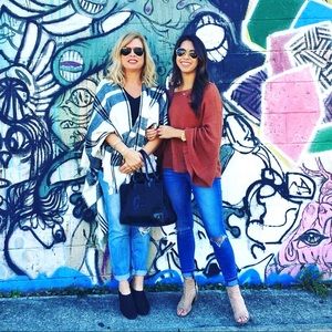 Rust, giant bell sleeve sweater.